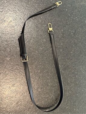 Louis Vuitton Black Pebble Adjustable Strap with Gold Hardware.